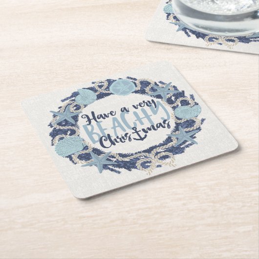 クリスマスコースタルトロピカルシーシェルリース – 青 スクエアペーパーコースター (アングル)