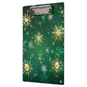 クリスマスゴールデンスノーフレークonグリーンバックグラウンド クリップボード (左)