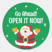 クリスマスサンタと一緒にパッケージを開く ラウンドシール (正面)