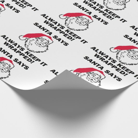 クリスマスサンタは保ちますそれを包まれた言います ラッピングペーパー (角)