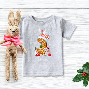 クリスマスサンタギンガーブレッドの名前レターJガール ベビーTシャツ