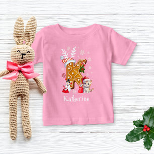 クリスマスサンタギンガーブレッド名レターKガール ベビーTシャツ