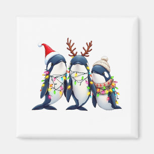 クリスマスサンタハットを着た3頭のクジラ マグネット