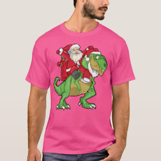 クリスマスサンタライディングTレックス恐竜の子供 Tシャツ