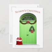 クリスマスシーズンのグリーティンググリーンドアテンプレート シーズンポストカード (正面/裏面)