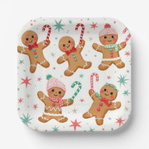 クリスマスジンジャーブレッドマンキャンディーキャンを保持