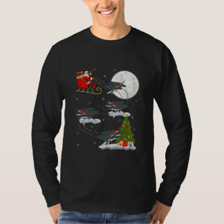 クリスマスス照明ツリーサンタリディングハンバッククジラ Tシャツ