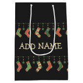 クリスマスソックスの季節のストッキングに名前を追加 ミディアムペーパーバッグ (裏面)