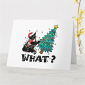 クリスマスツリーおもしろいを押している黒猫サンタ カード (黄色い花)
