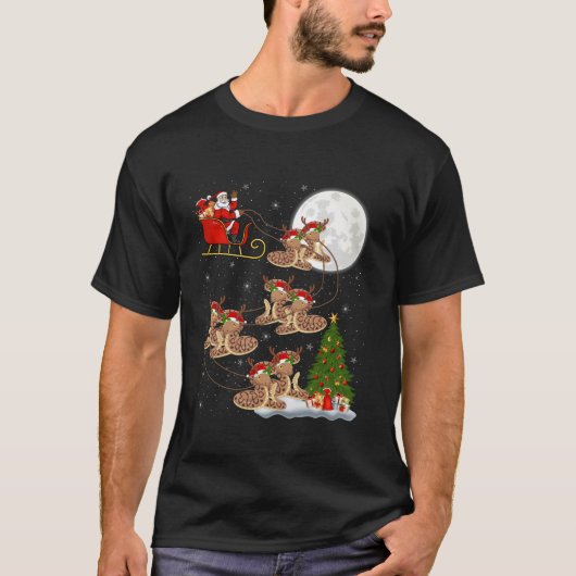 クリスマスツリーおもしろいライツサンタライディングスネーククリスマ Tシャツ (正面)