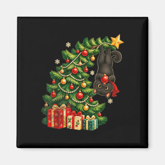 クリスマスツリーからぶら下がる黒猫のペット マグネット