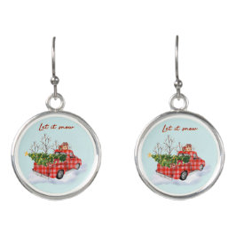 クリスマスツリーと一緒に雪の赤いトラックに イヤリング