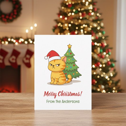 クリスマスツリーと赤い帽子の不機嫌なトラ猫 ポストカード