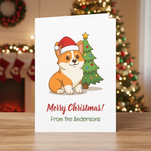 クリスマスツリーと赤い帽子をかぶった可愛いコーギー犬 カード