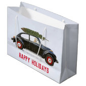 クリスマスツリーと車のゴールデンレトリバー ラージペーパーバッグ (正面アングル)