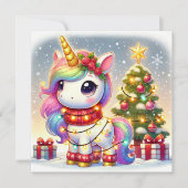 クリスマスツリーのそばに立つライトを飾ったユニコーン シーズンカード (正面)