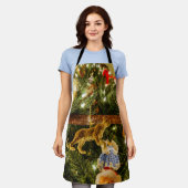 クリスマスツリーのエプロンを見上げる エプロン (着用した状態)