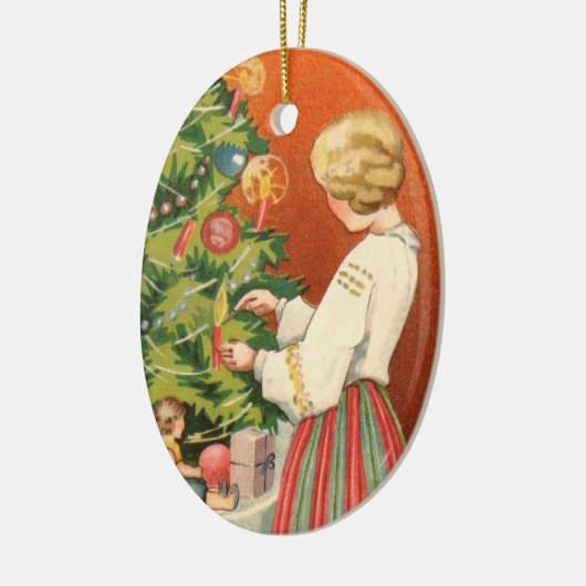 クリスマスツリーのオーナメントのエストニア語の女の子 セラミックオーナメント (左)