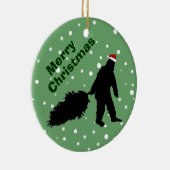 クリスマスツリーのオーナメントを引っ張っているおもしろいなビッグフット セラミックオーナメント (右)