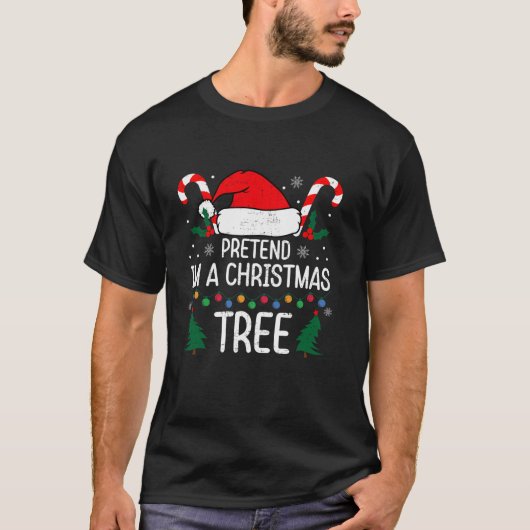 クリスマスツリーのクリスマスのコおもしろいストのふりをする Tシャツ (正面)
