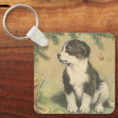 クリスマスツリーの下でヴィンテージクリスマス、かわいい子犬 キーホルダー (正面)