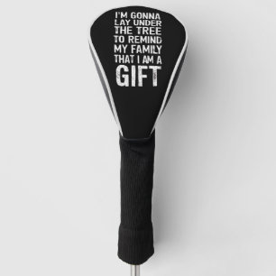 クリスマスツリーの下で家族のプレゼントを楽しむ ゴルフヘッドカバー