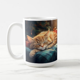 クリスマスツリーの下で眠るオレンジ色の子猫 コーヒーマグカップ