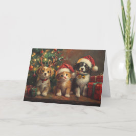 クリスマスツリーの下の可愛い犬と猫 シーズンカード