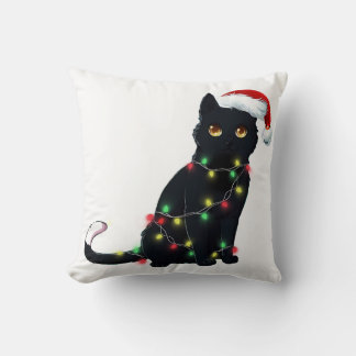 クリスマスツリーの光に照らされたサンタ黒猫 クッション