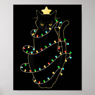 クリスマスツリーの光に照らされたサンタ黒猫 ポスター