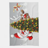 クリスマスツリーの後ろのサンタクロースとトナカイ.j キッチンタオル (縦)