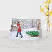 クリスマスツリーを家に運ぶ グリーティングカード (黄色い花)