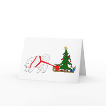 クリスマスツリーを引っ張っているSamoyedを引いて下さい