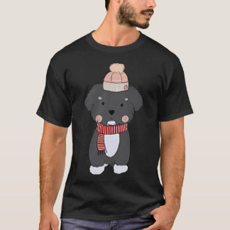 クリスマスツリーを飾ったかわいい子犬 Tシャツ