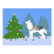 クリスマスツリー-森林--を飾っているシベリアンハスキー 葉書き