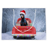 クリスマストラックに座って雪の中のドバーマンドッグ ラージペーパーバッグ (正面)