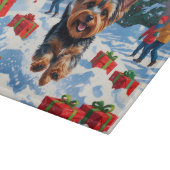 クリスマスハットと雪のヨークシャー・テリア カッティングボード (角)