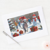 クリスマスハットをかぶったスフィンクス猫の雪中奔走 長方形シール (封筒)