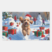 クリスマスハットをかぶって雪の中を走るコッカプー 長方形シール (正面)