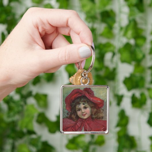 クリスマスビクトリアンチャイルドレッドハットガールポートレートAr キーホルダー (手)