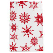 クリスマスフェスティバルホワイト&レッドスノーフレークススターズ ミディアムペーパーバッグ (正面)