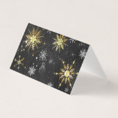 クリスマスブラックバックグラウンド上のゴールデンスノーフレーク (裏面)