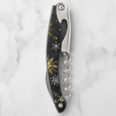 クリスマスブラックバックグラウンド上のゴールデンスノーフレーク ソムリエナイフ (裏面)