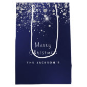 クリスマスブルーの白いグリッターのダストシルバー ミディアムペーパーバッグ (裏面)