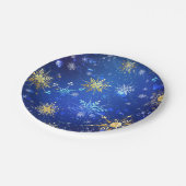 クリスマスブルーバックグラウンドと黄金の雪片 ペーパープレート (アングル)