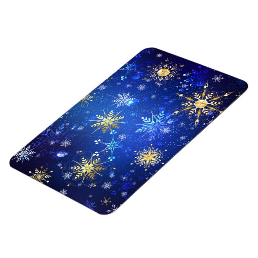 クリスマスブルーバックグラウンドと黄金の雪片 マグネット (左側)