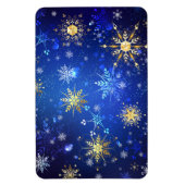 クリスマスブルーバックグラウンドと黄金の雪片 マグネット (縦)