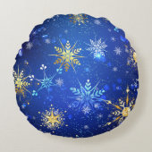 クリスマスブルーバックグラウンドと黄金の雪片 ラウンドクッション (正面)
