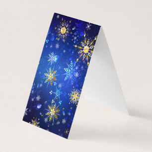 クリスマスブルーバックグラウンドと黄金の雪片 名刺