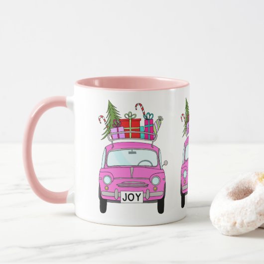クリスマスプレゼントが贈られるピンクの車 マグカップ (ドーナツ)